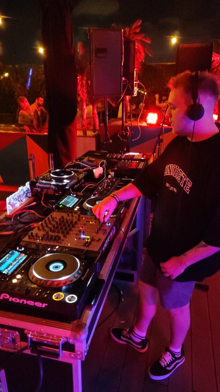 DJ performing at a night event