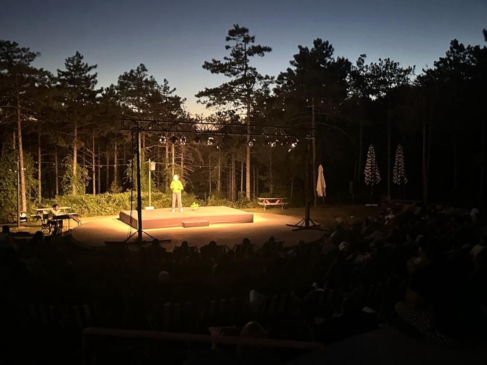 Outdoor theater lit at dusk